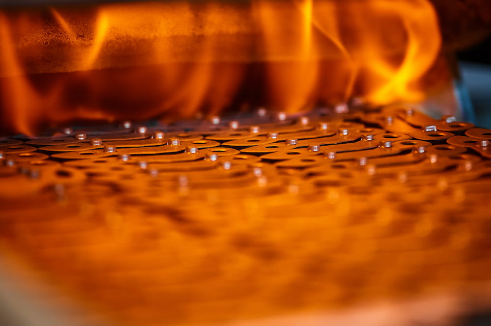 Annealing powdered details with burning flame in furnace