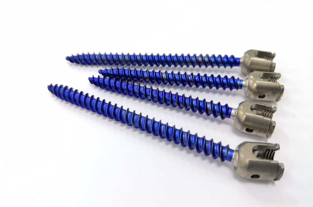 Closeup Image Of Blue Pedicle Screws for Spine Fusion Surgery